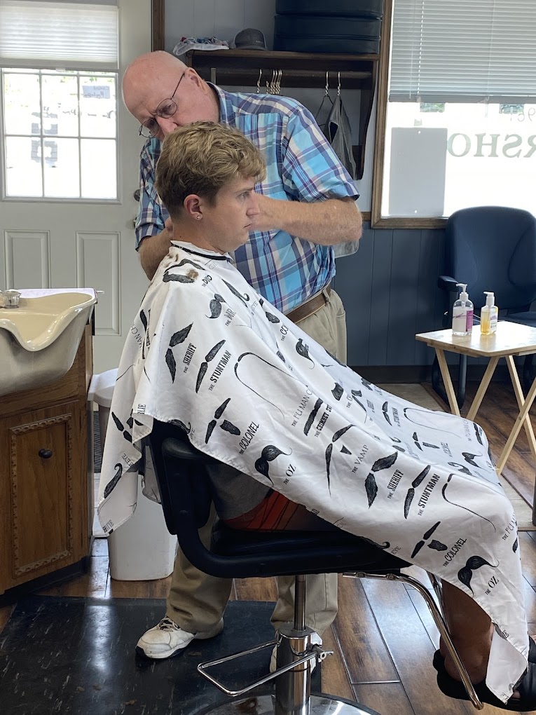 Barber at work at Grandville Barbershop