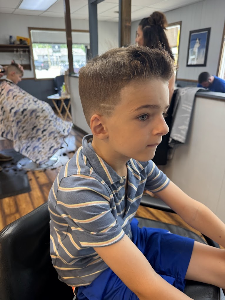Kid's fresh haircut at Grandville Barbershop